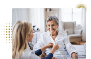 A lady helping an older lady