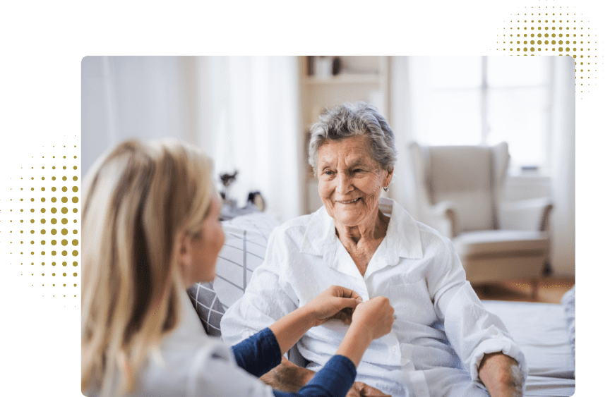 A lady helping an older lady