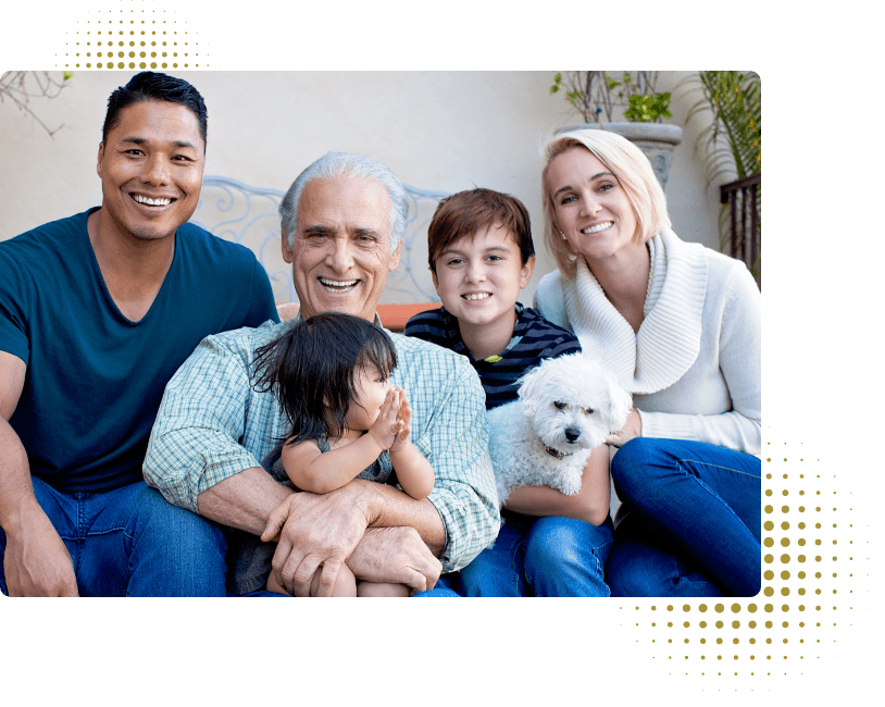 Several generations of a Family together with a child and dog